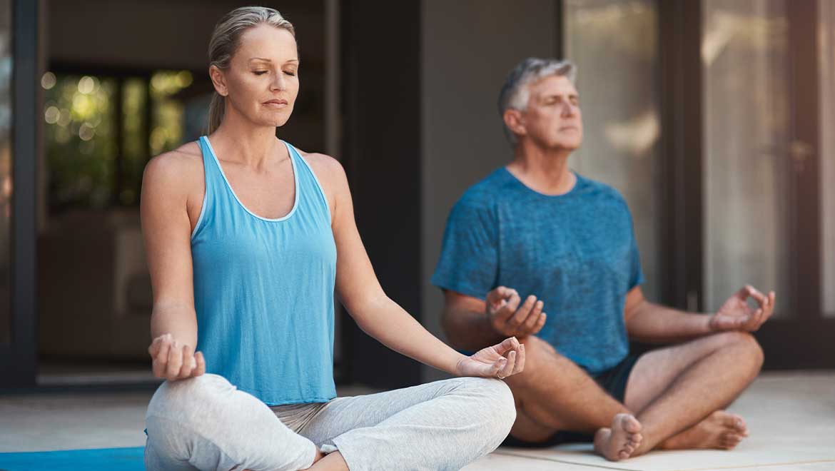 Couple meditating together