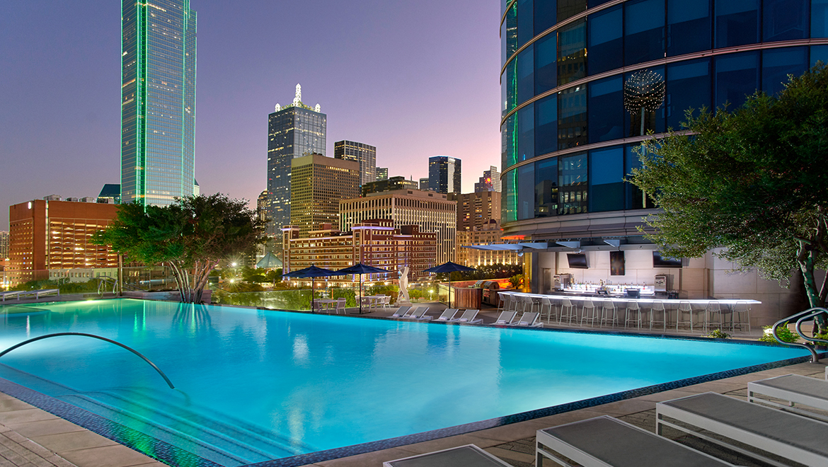 View of rooftop pool at dusk.