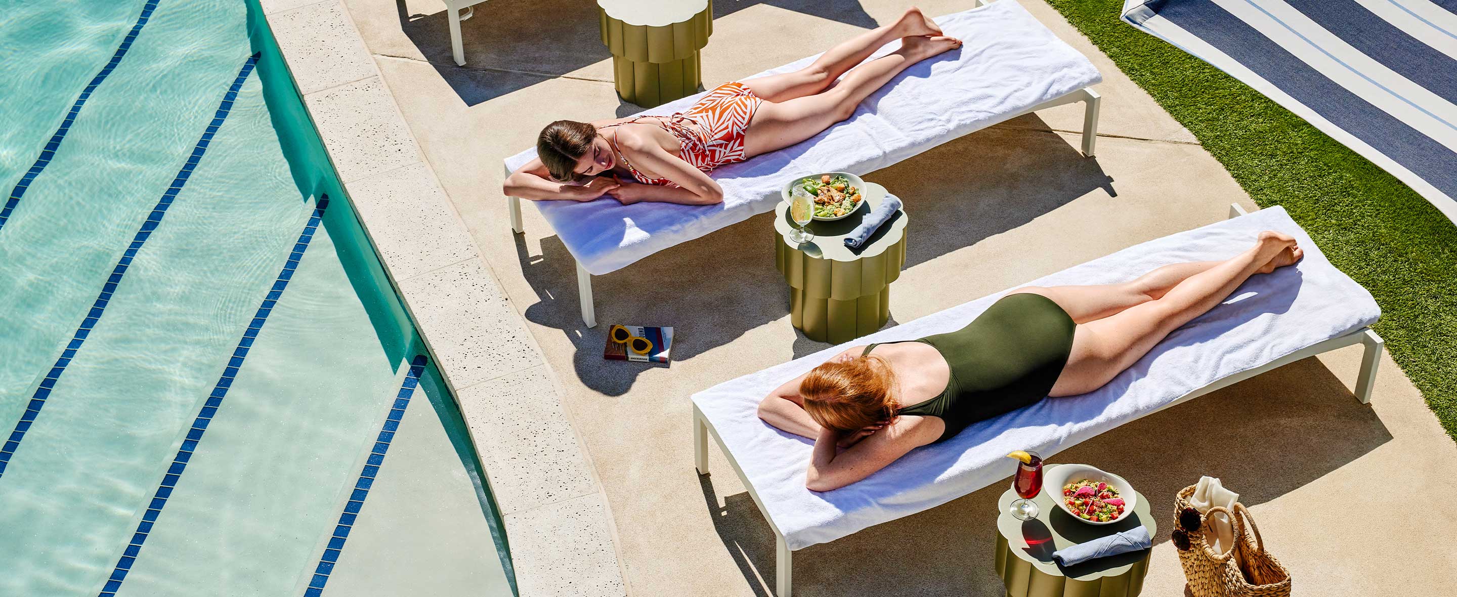 Guests relaxing by the pool