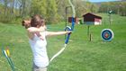 Practicing archery at the Homestead