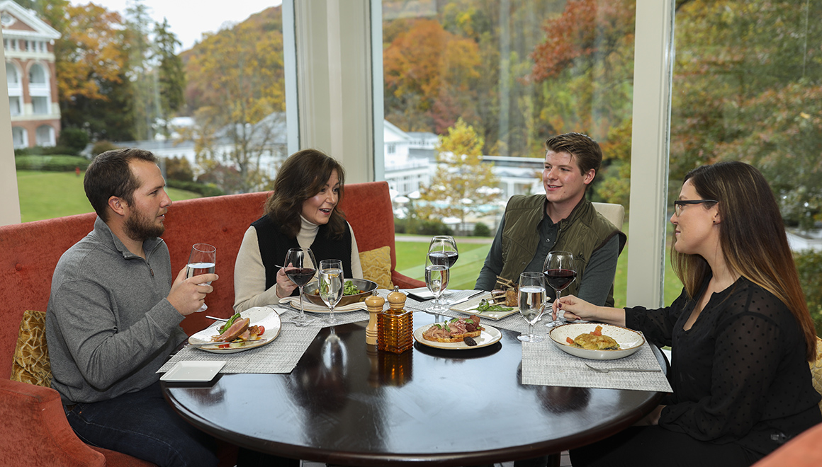 Friends eating at Omni Homestead Resort