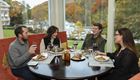 Friends eating at Omni Homestead Resort