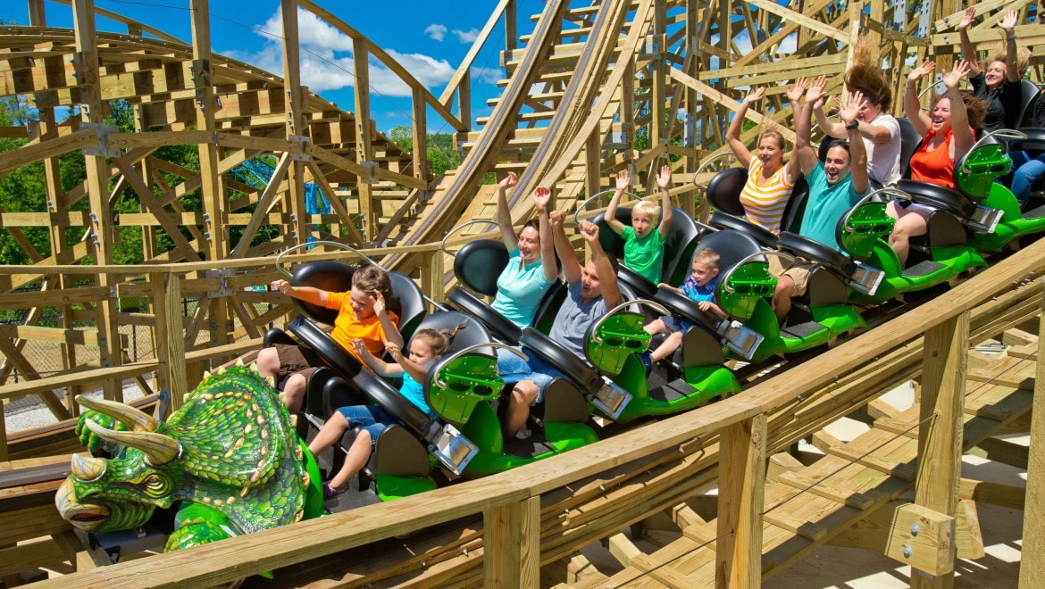 People riding a roller coaster