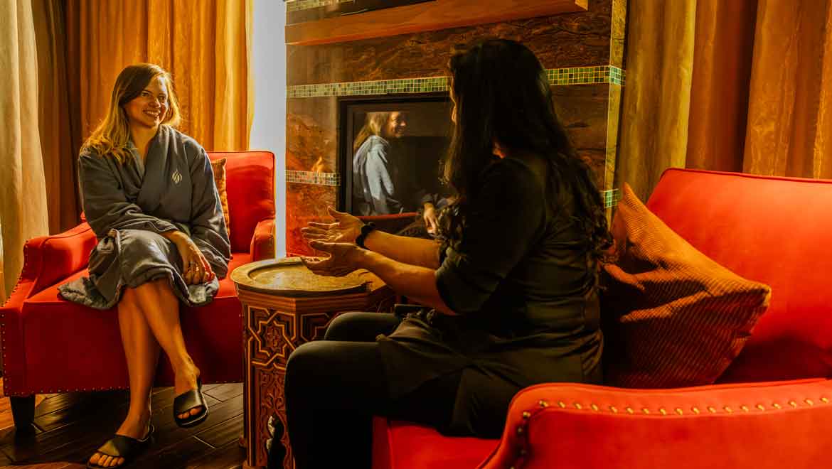 Two women talking in spa room.